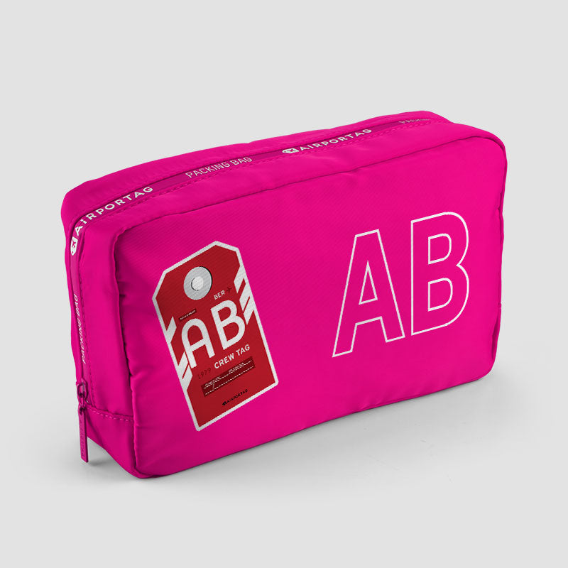 AB-iata-code-packing-bag-pink.jpg